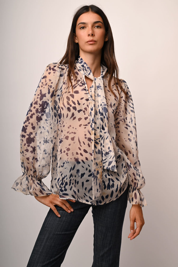Blusa a stampa astratta con fiocco