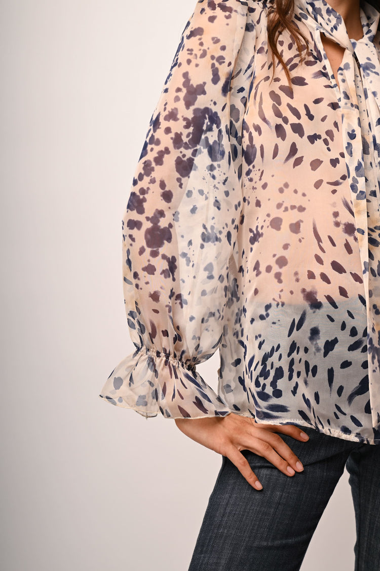 Blusa a stampa astratta con fiocco