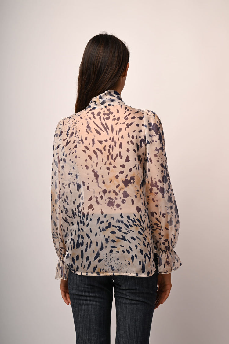 Blusa a stampa astratta con fiocco