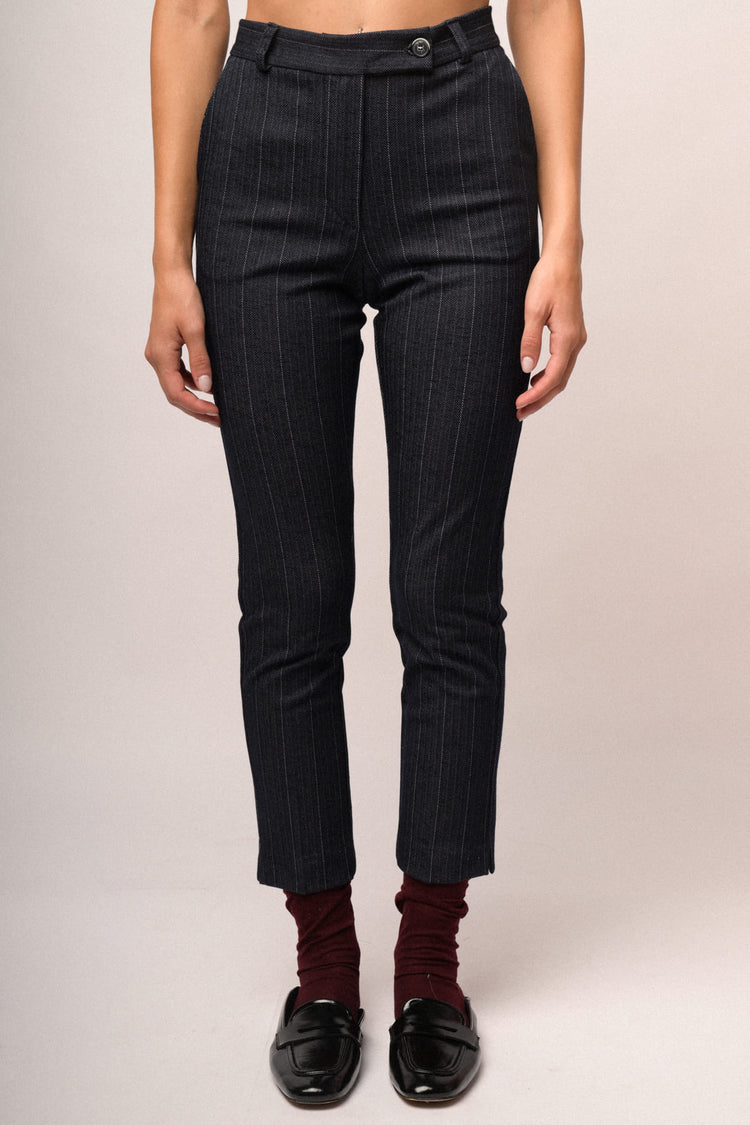 Pantaloni slim-fit con motivo gessato blu