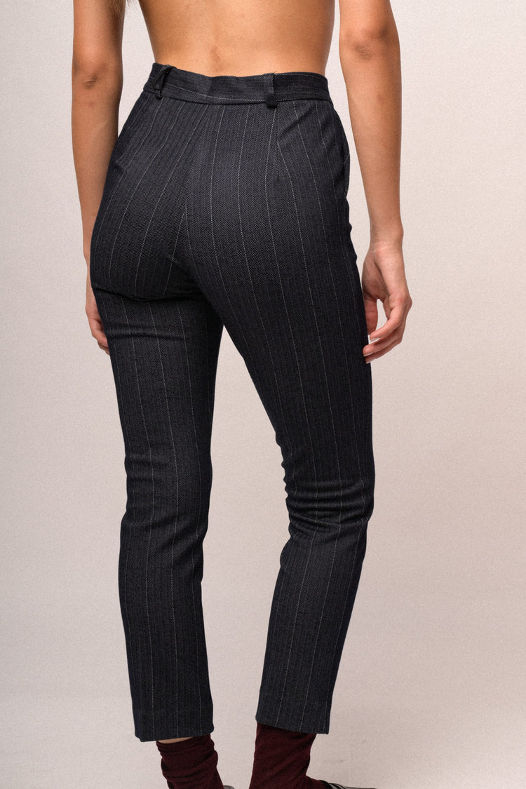Pantaloni slim-fit con motivo gessato blu
