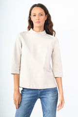 Blusa con collo a cratere