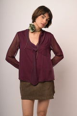 Blusa in tulle bordeaux a stampa con nastro