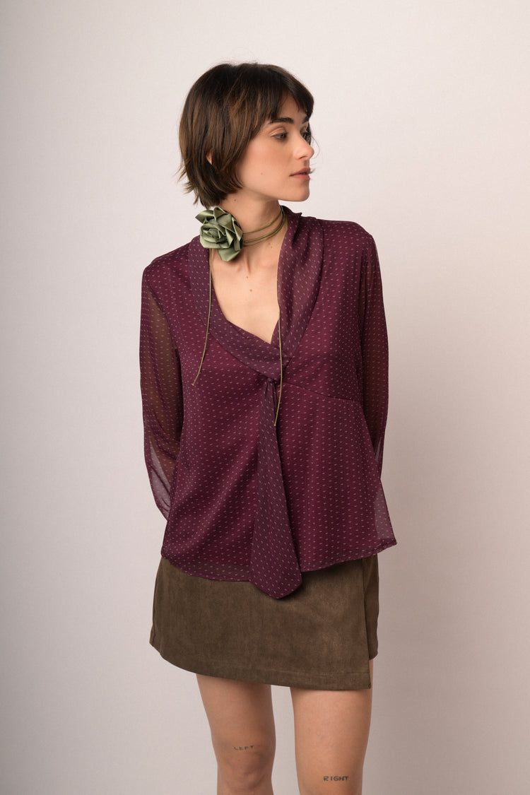 Blusa in tulle bordeaux a stampa con nastro