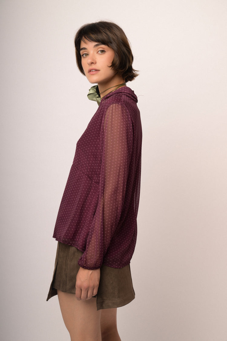 Blusa in tulle bordeaux a stampa con nastro
