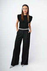 Pantaloni palazzo con baschina