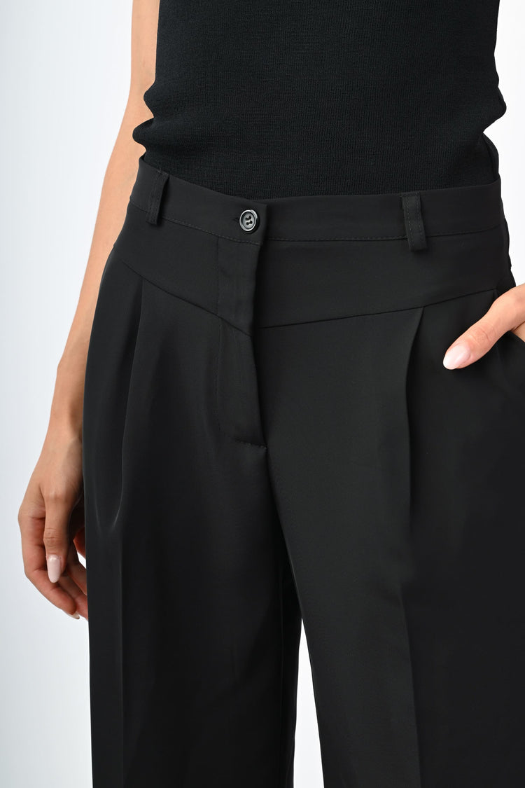 Pantaloni palazzo con baschina