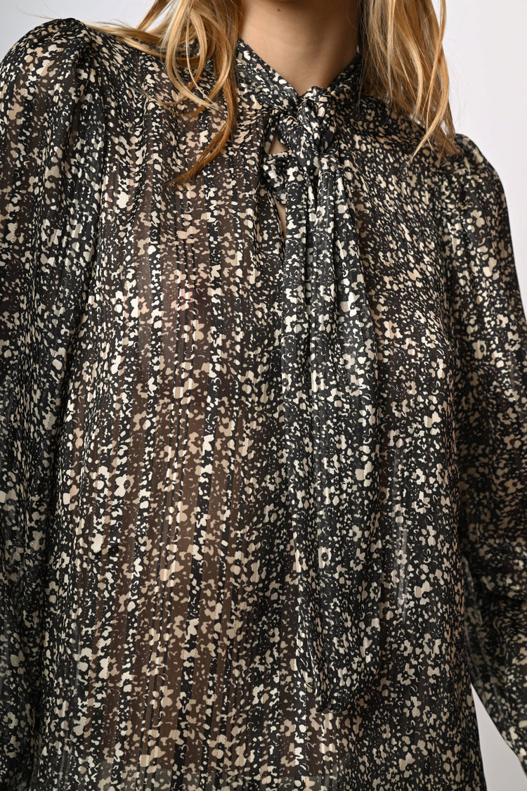 Blusa con fiocco e stampa floreale