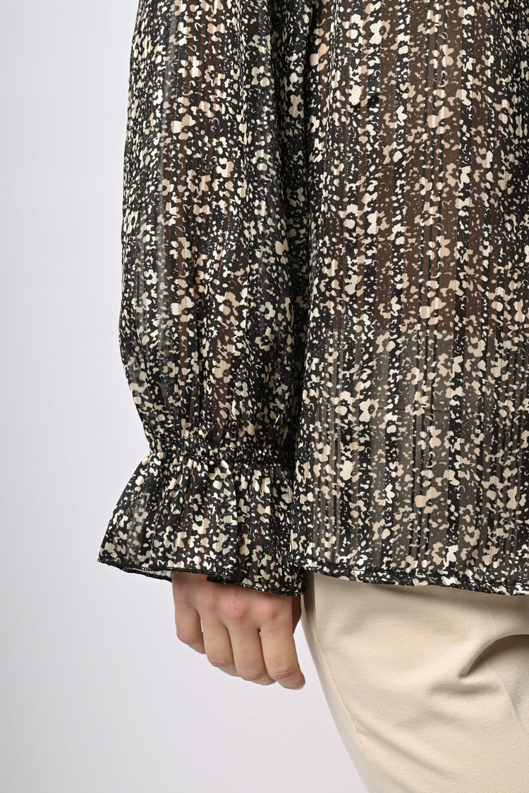 Blusa con fiocco e stampa floreale