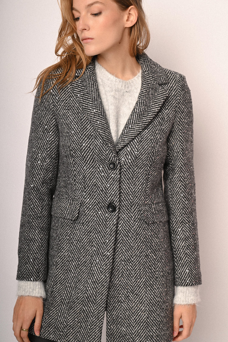 Cappotto con motivo chevron e paillettes
