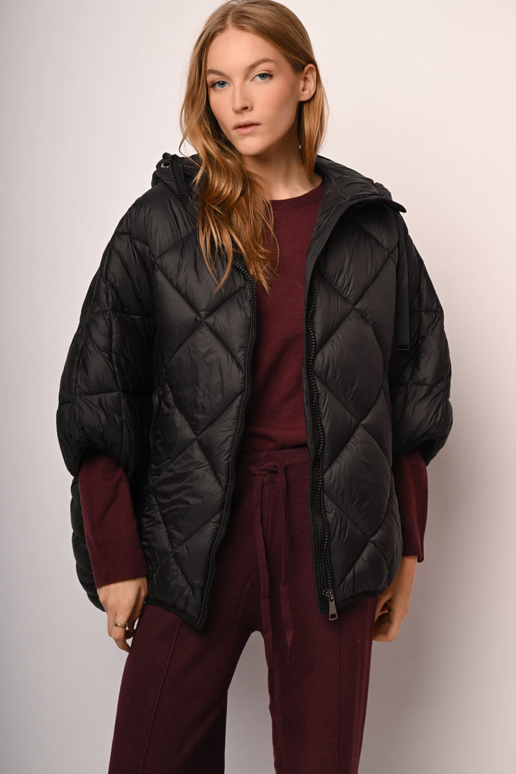 Piumino oversize a cappa