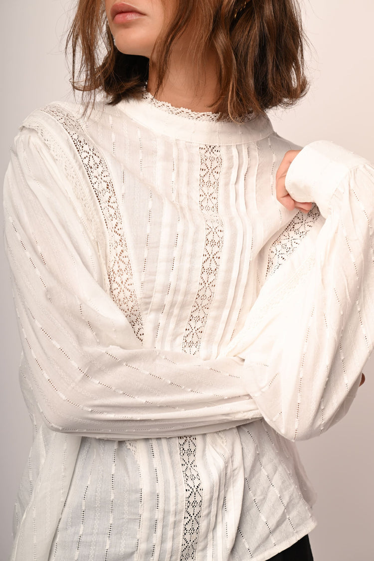 Blusa con inserti in pizzo