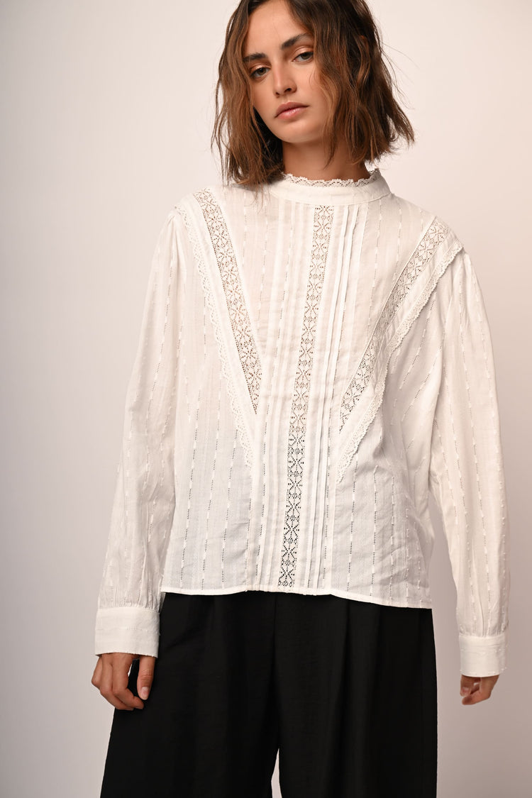 Blusa con inserti in pizzo