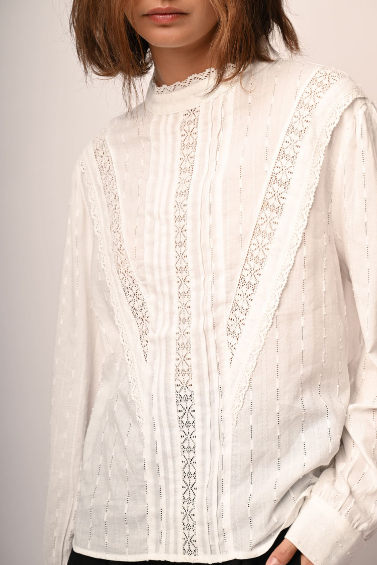 Blusa con inserti in pizzo