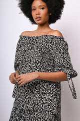 Blusa con spalle scoperte e stampa floreale