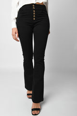 Pantaloni svasati con bottoni