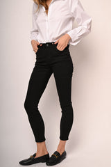 Jeans skinny con bottone gioiello