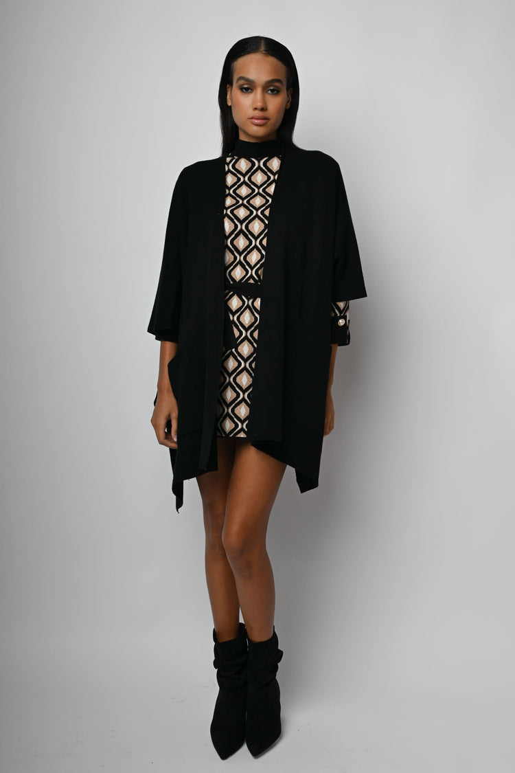 Soprabito-poncho in maglia
