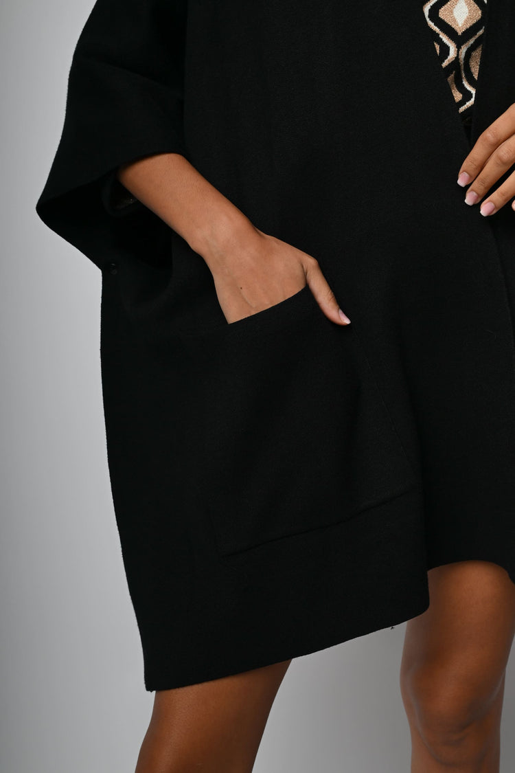 Soprabito-poncho in maglia