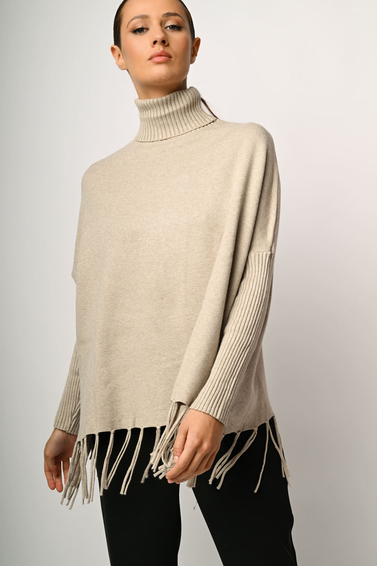 Dolcevita oversize con frange