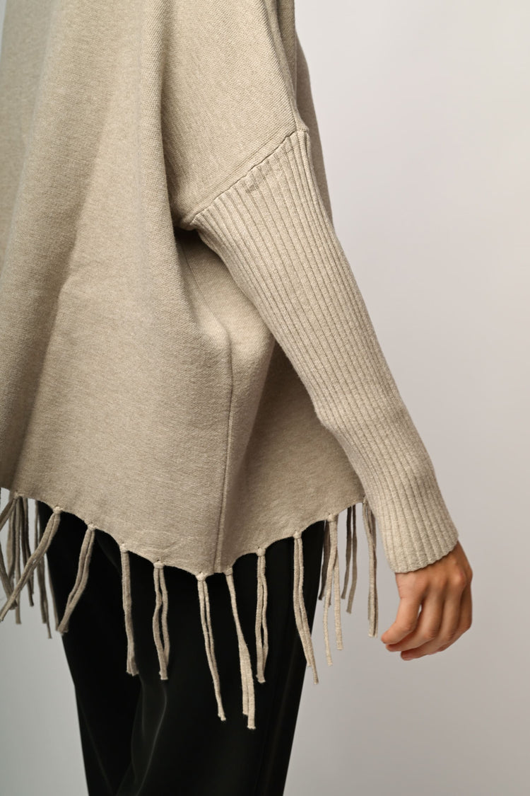 Dolcevita oversize con frange