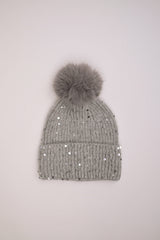 Berretto con paillettes e pompon