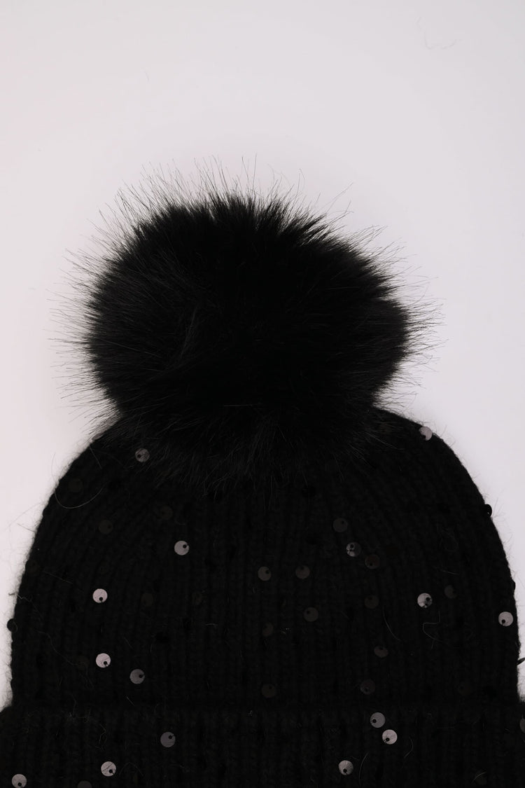 Berretto con paillettes e pompon