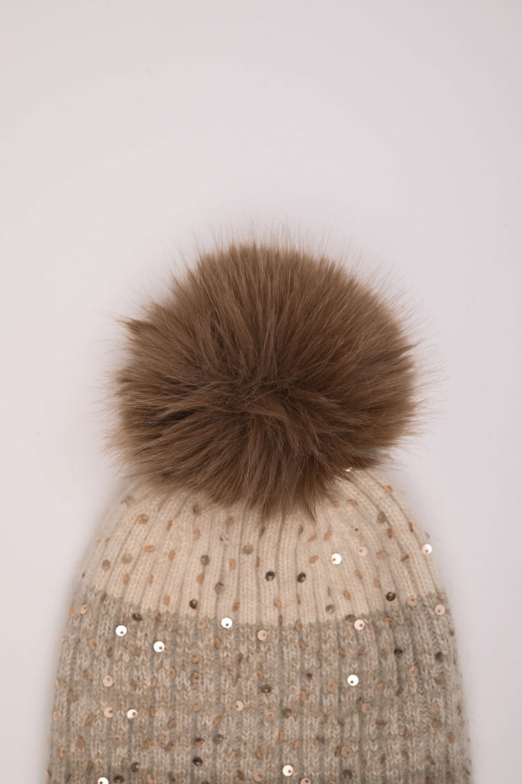 Berretto color-block con paillettes e pompon