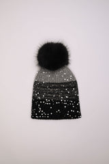 Berretto color-block con paillettes e pompon