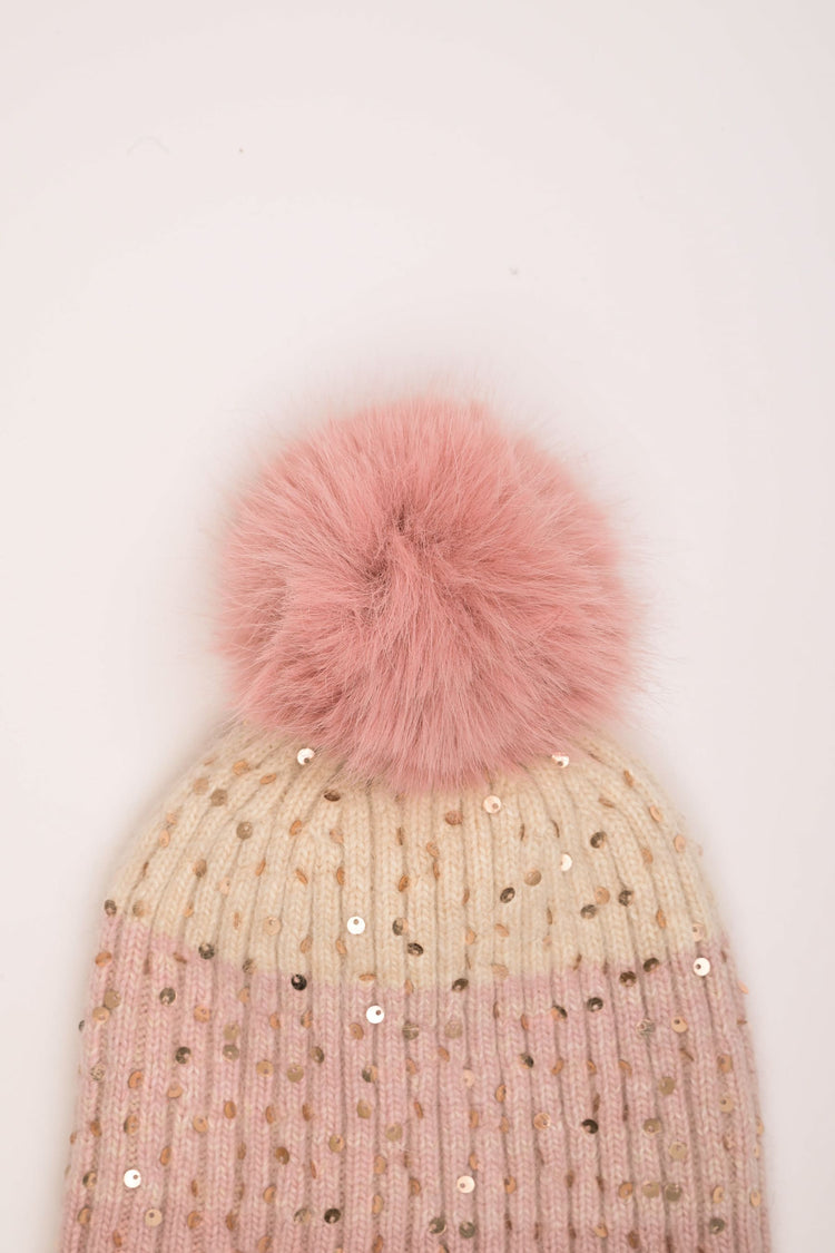 Berretto color-block con paillettes e pompon