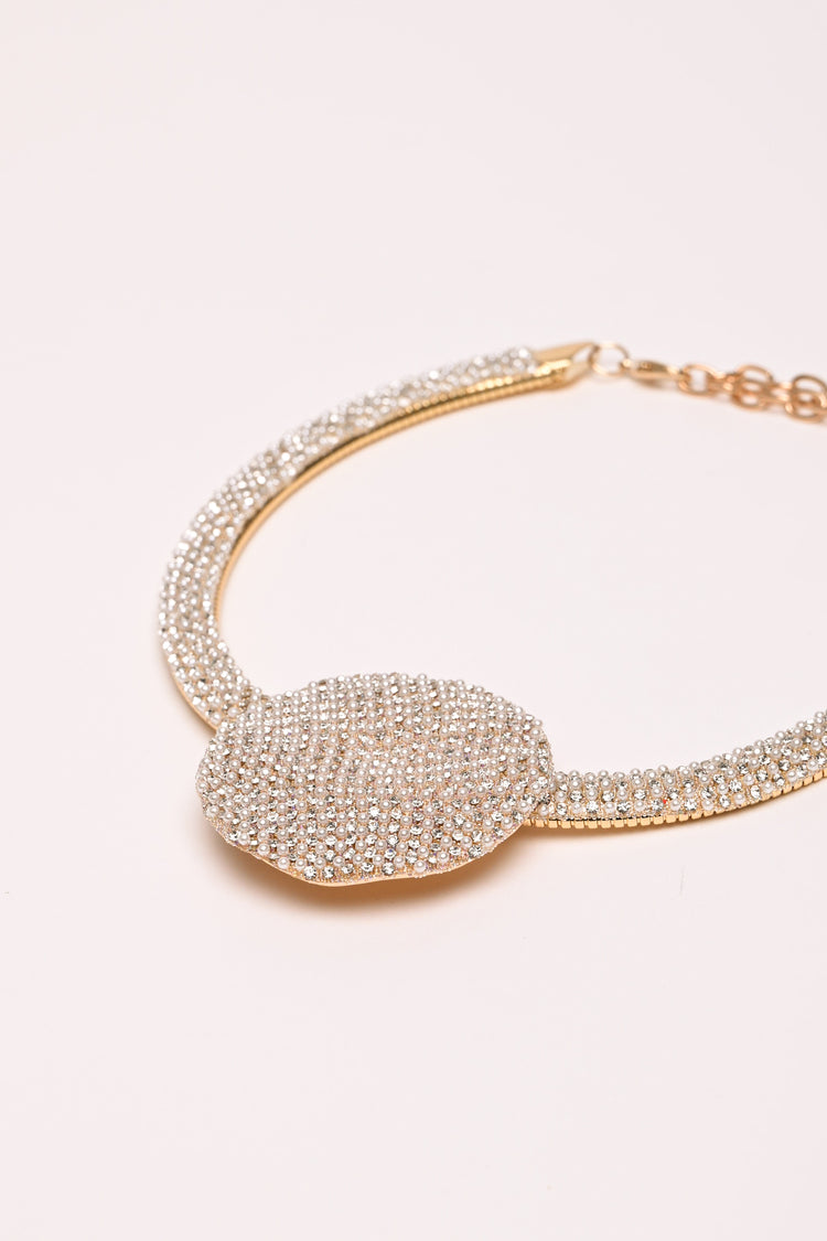 Collana rigida con strass e disco