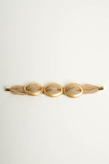 Bracciale in tessuto dorato con ovali
