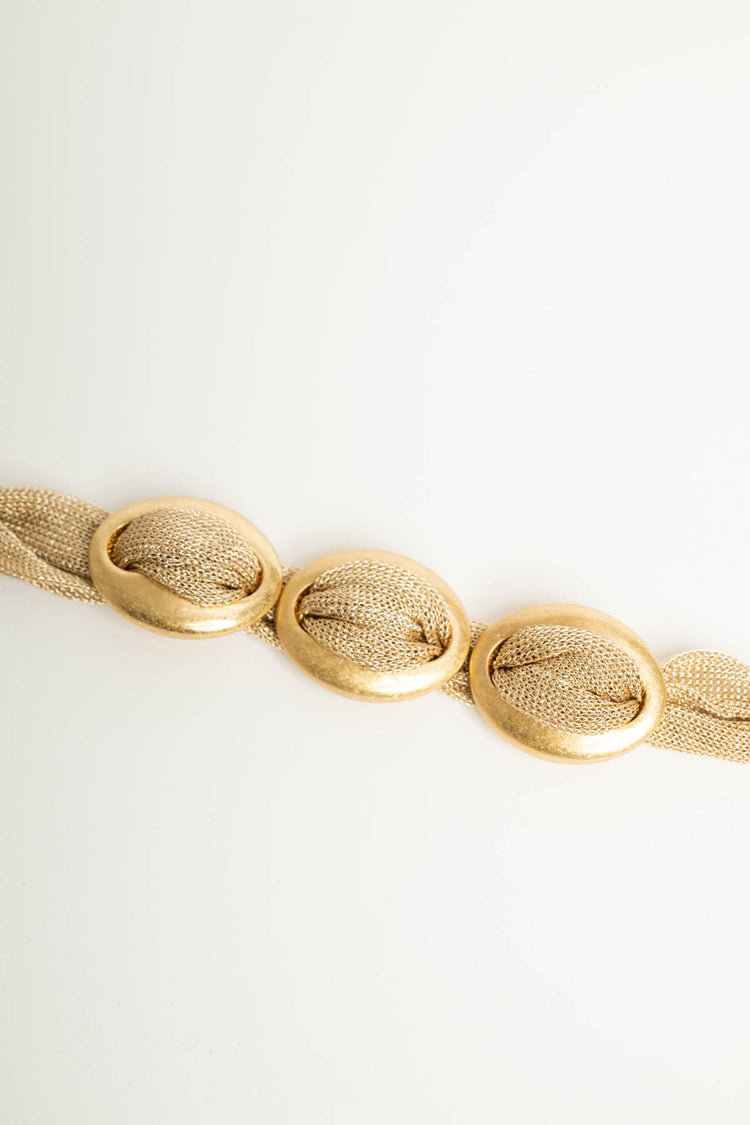 Bracciale in tessuto dorato con ovali