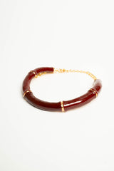 Collana girocollo rigida smaltata bordeaux
