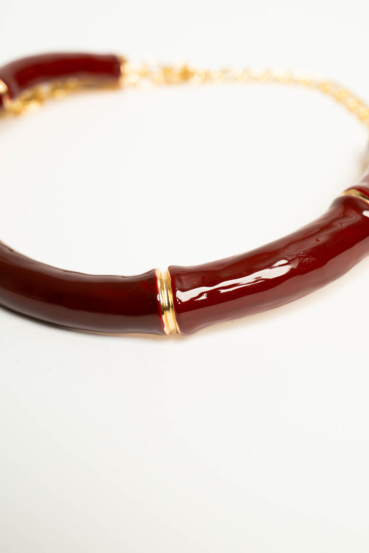 Collana girocollo rigida smaltata bordeaux