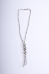 Collana lunga con nodo intrecciato