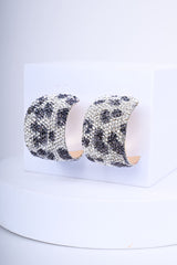 Orecchini con strass animalier