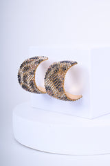 Orecchini con strass animalier