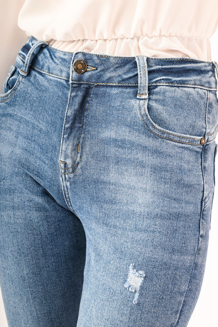 Jeans skinny con strappi