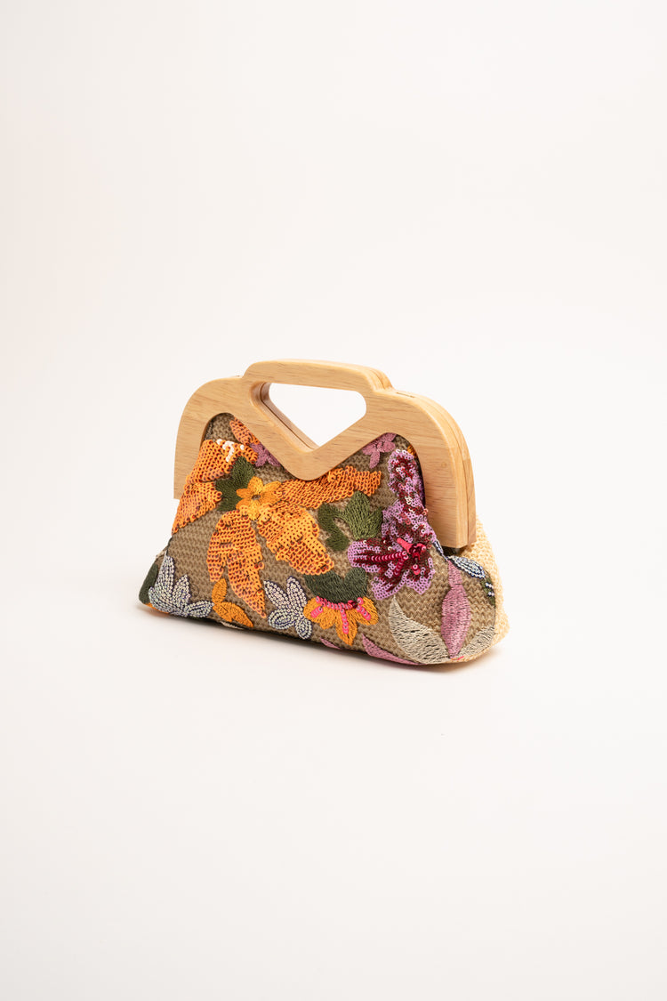 Borsa clutch multicolor con paillettes e manico in legno