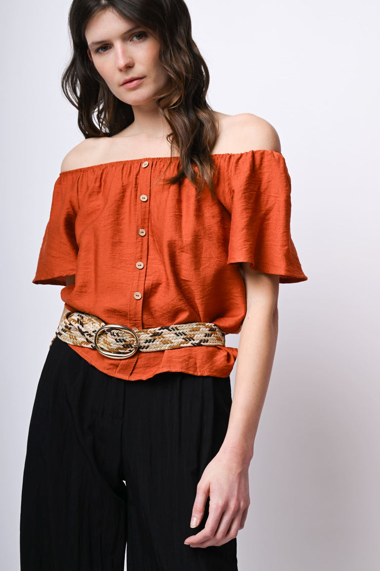 Top a spalle scoperte con bottoni