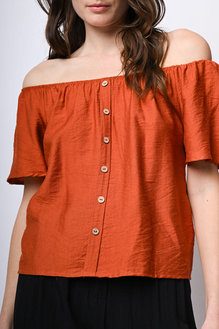 Top a spalle scoperte con bottoni