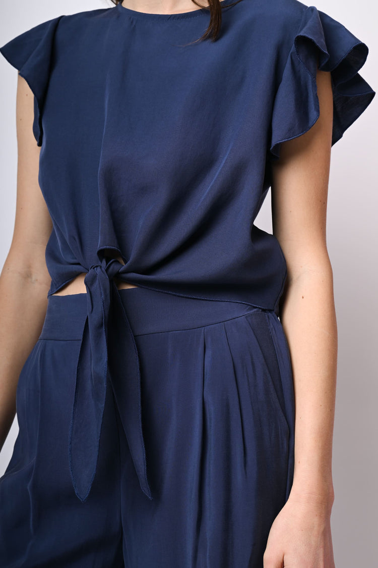 Top crop con nodo alla vita