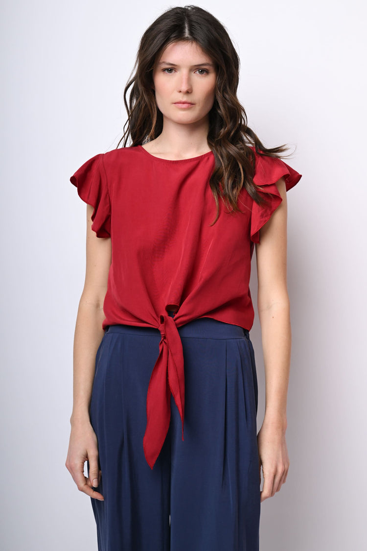 Top crop con nodo alla vita