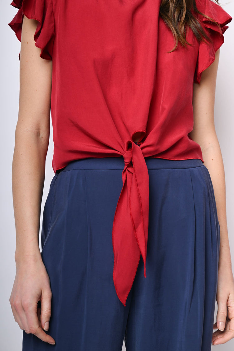 Top crop con nodo alla vita