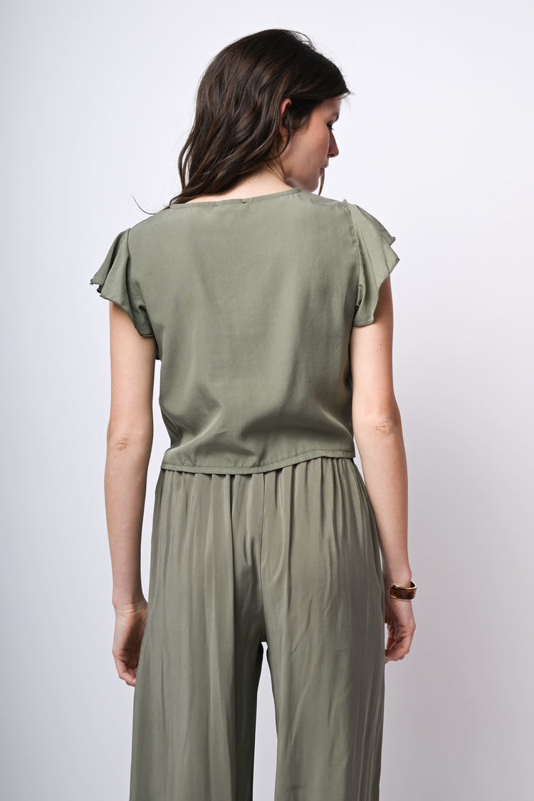 Top crop con nodo alla vita