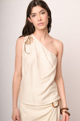 Top monospalla beige con fiore 3D