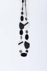 Collana lunga con pendenti