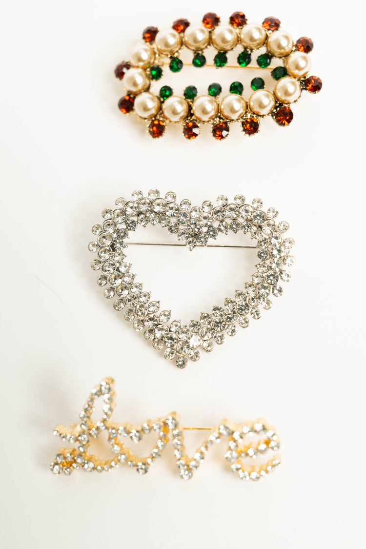 Set da tre spille con strass multicolor
