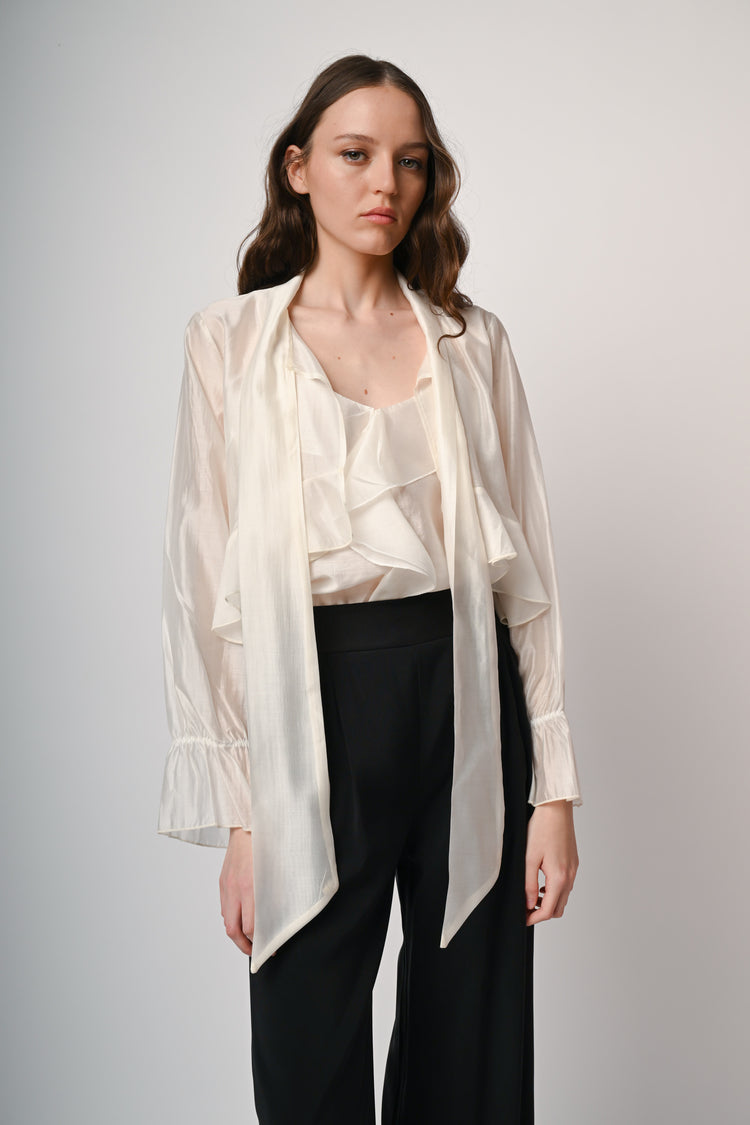 Blusa con fiocco e maniche lunghe